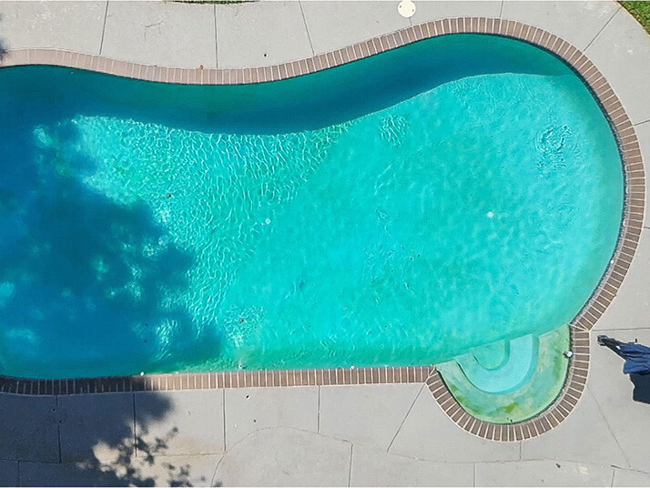 dirty pool with algae on bottom